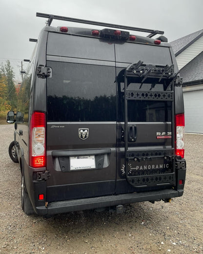 Phlosystem bicycle transport kit installed on a Ram promaster.