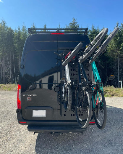 Phlosystem bicycle transport kit with three bicycles mounted on a Mercedez-Benz Sprinter