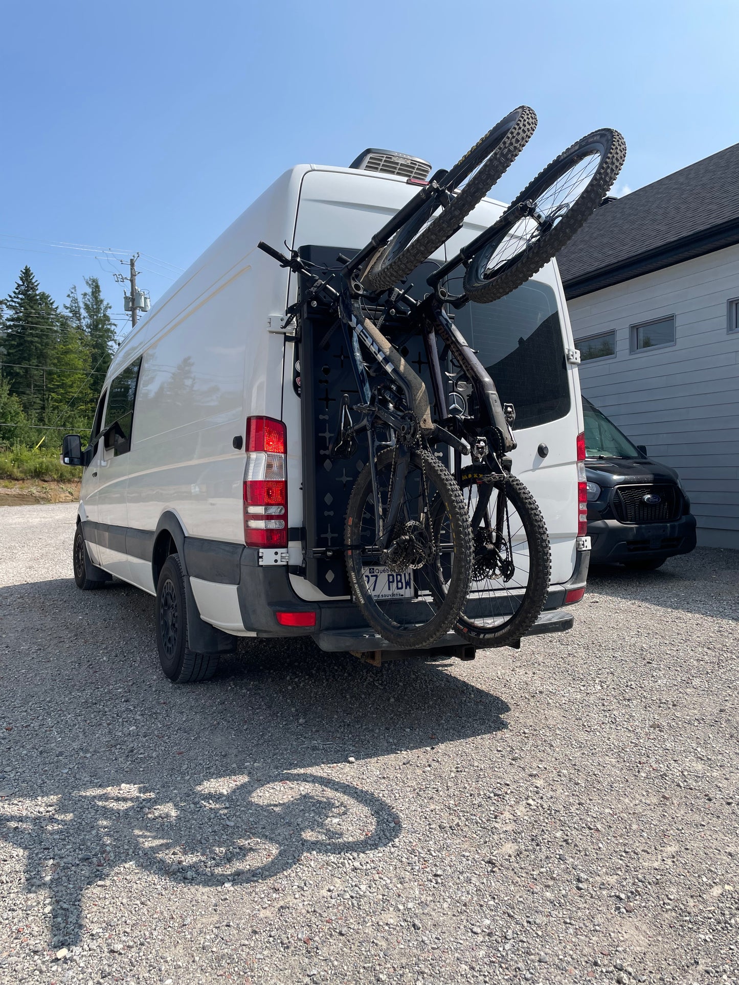 Phlosystem bicycle transport kit with two bikes on a Mercedes-Benz Sprinter