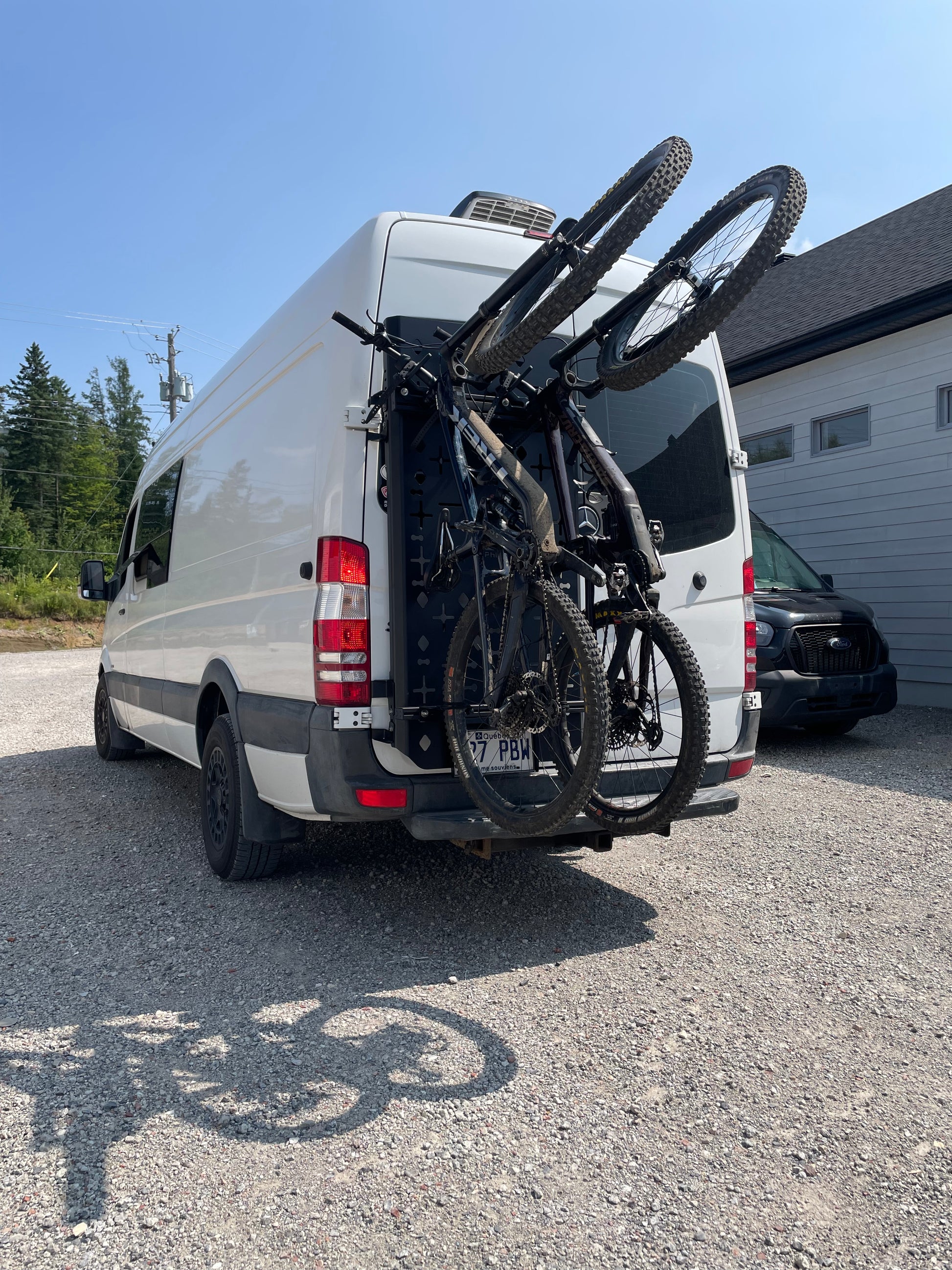 Phlosystem bicycle transport kit with two bikes on a Mercedes-Benz Sprinter