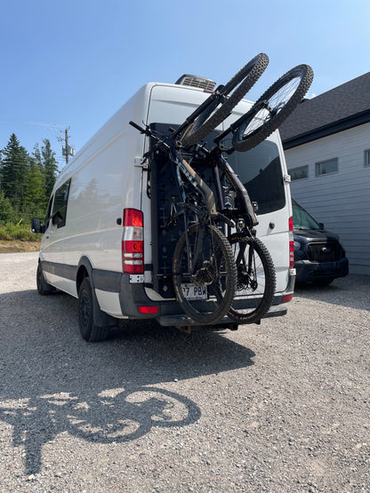 Phlosystem bicycle transport kit with two bikes on a Mercedes-Benz Sprinter