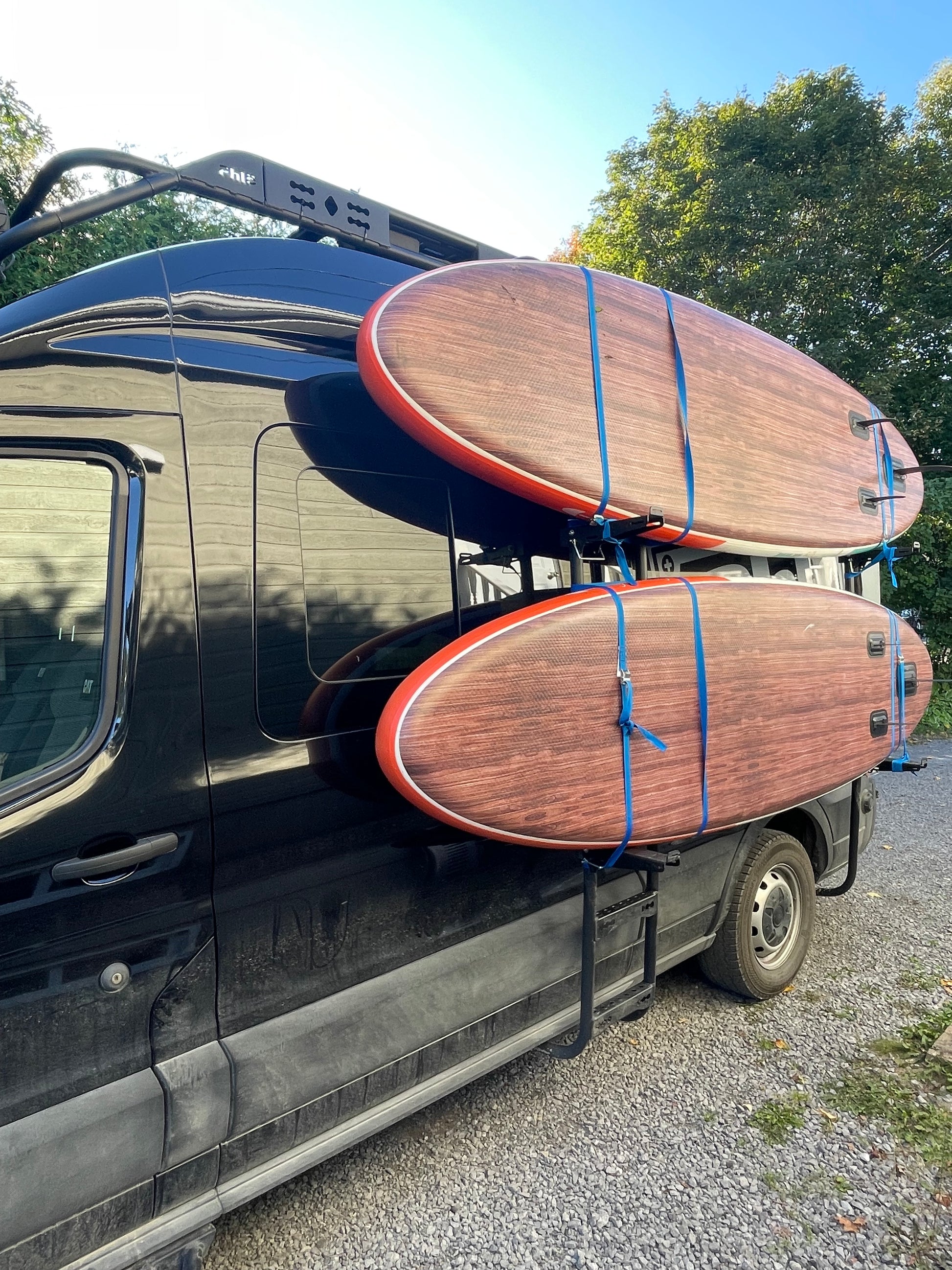 Phlosystem paddle board carrier system for van