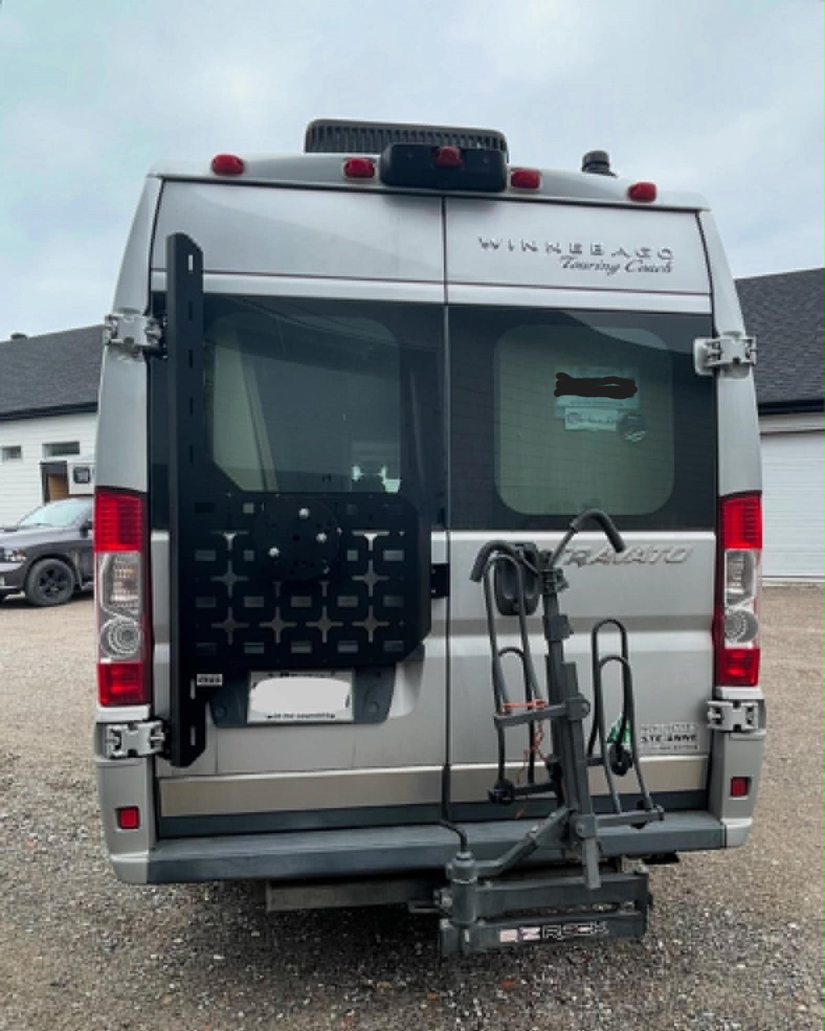 Spare tire carrier 3.0 installed on a Winnebago Travato
