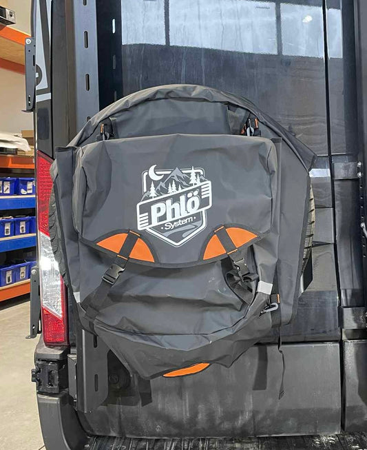 Phlosystem spare tire cover on a spare tire.